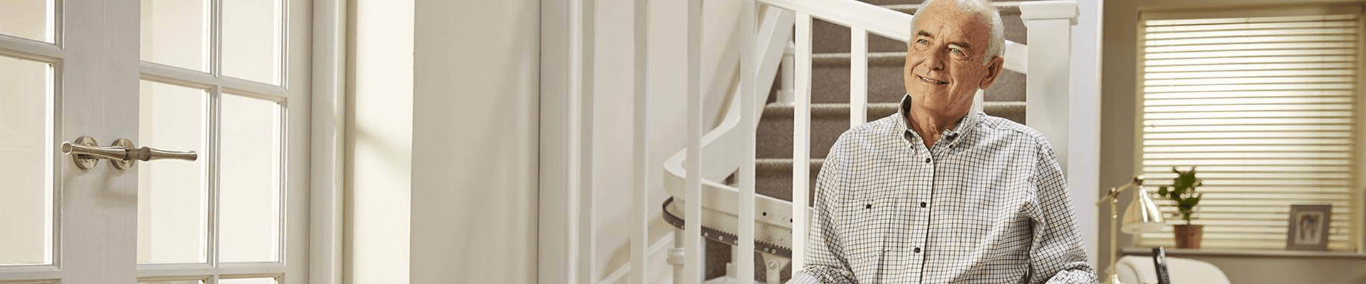 Man using a Acorn Stairlift